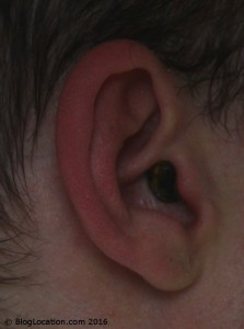 11_wearing_foam_ear_plug_cut_and_painted_black_side_view